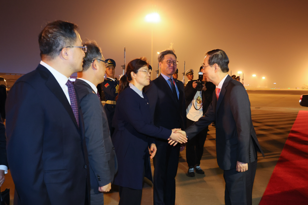 PM Returns to Korea from Hangzhou in Chinese