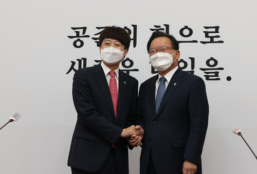 PM meets a new head of the people power party