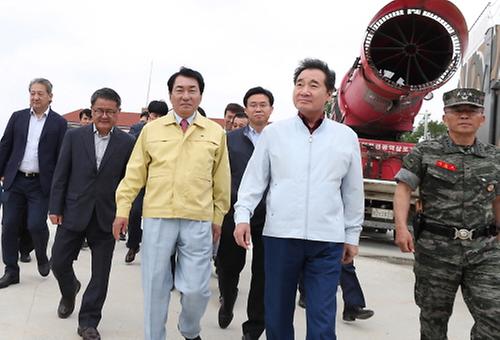 PM Lee checks fight against African swine fever. 1