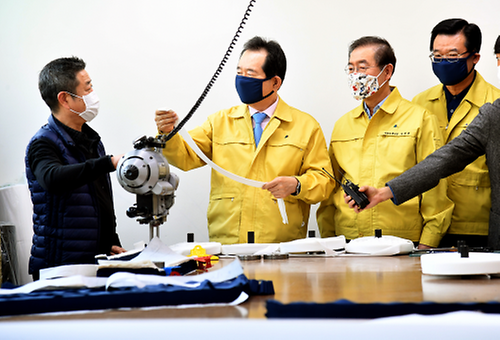 PM visits mask maker